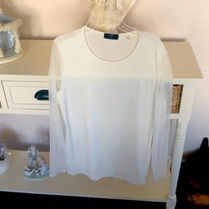 Beautiful white blouse with sheer sleeves. Perfect for evening wear
